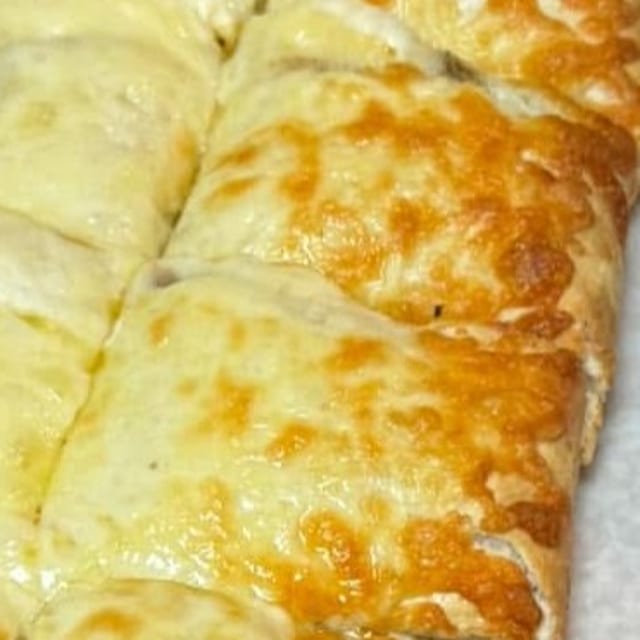 Grilled Chicken Onions & Peppers Calzone.